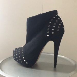Black high heel ankle boots with side zipper